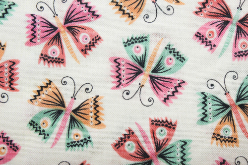 Designer- Baumwollstoff Flutter creme (10 cm)