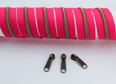 Endlosreißverschluss metallisiert pink/messing-antik (1m)