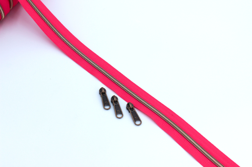 Preview: Endlosreißverschluss metallisiert pink/messing-antik (1m)