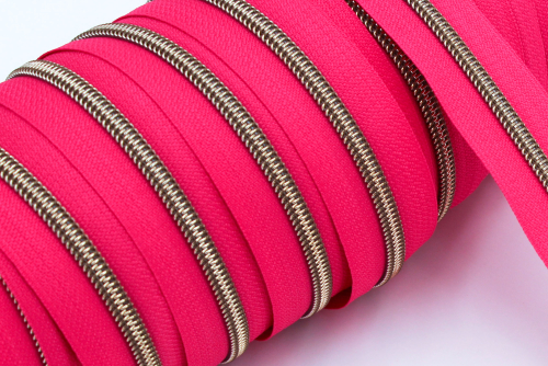 Endlosreißverschluss metallisiert pink/messing-antik (1m)