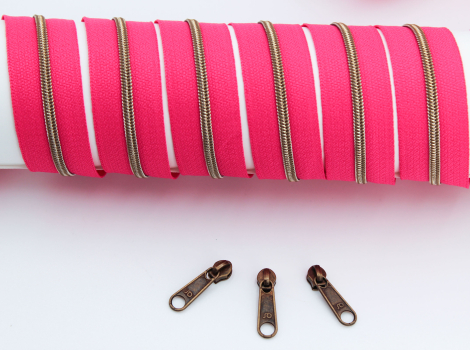 Endlosreißverschluss metallisiert schmal pink/messing-antik (1m)