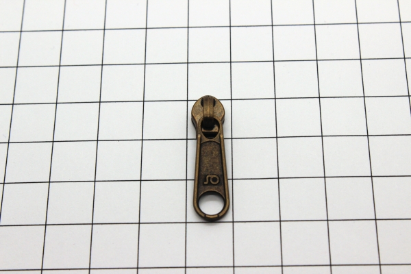 loser Bügelschieber messing-antik schmal