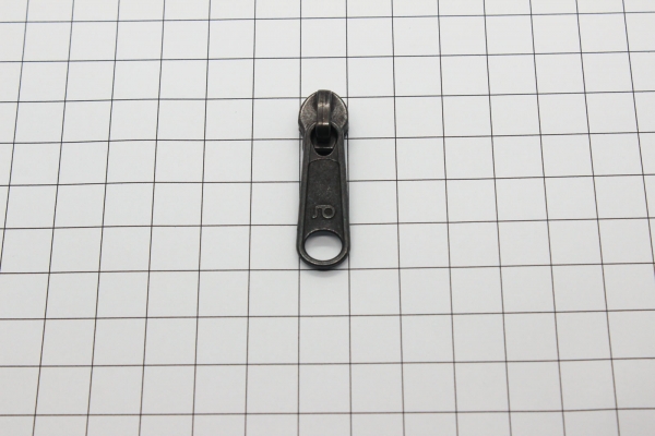 loser Bügelschieber messing- schwarz