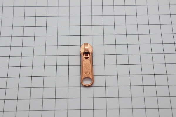 loser Bügelschieber kupfer