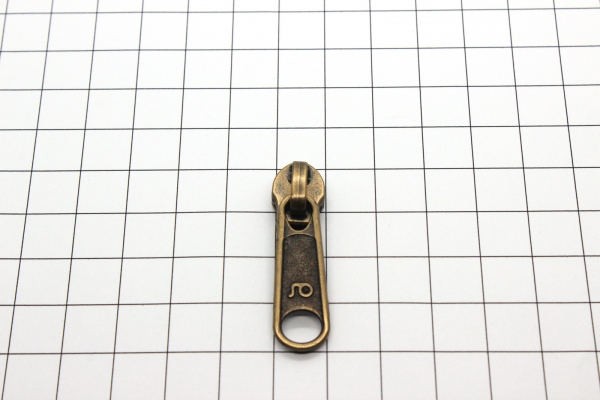 loser Bügelschieber messing-antik