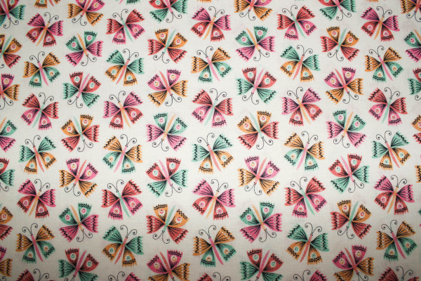 Designer- Baumwollstoff Flutter creme (10 cm)