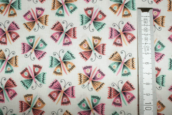 Designer- Baumwollstoff Flutter creme (10 cm)