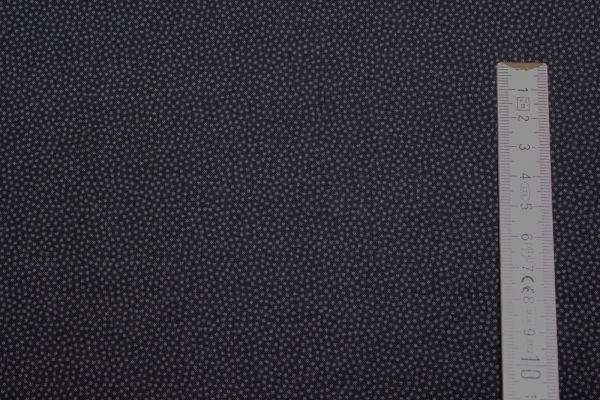 Baumwolle unregelmäßige Pünktchen schwarz (10 cm)