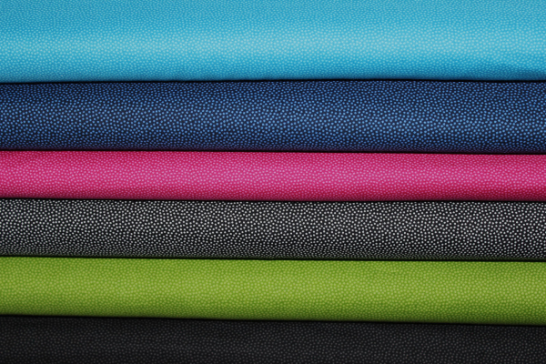 Baumwolle unregelmäßige Pünktchen grün (10 cm)